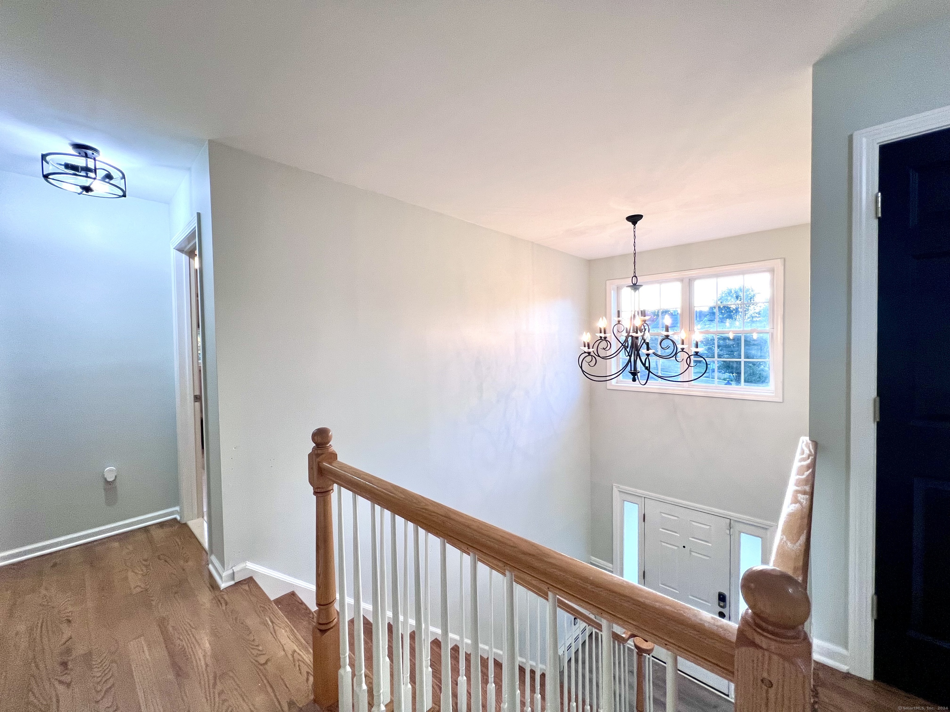 4 Cobblestone Court Naugatuck, CT 06770 - Photo 17 of 34 a view of a hallway to a window