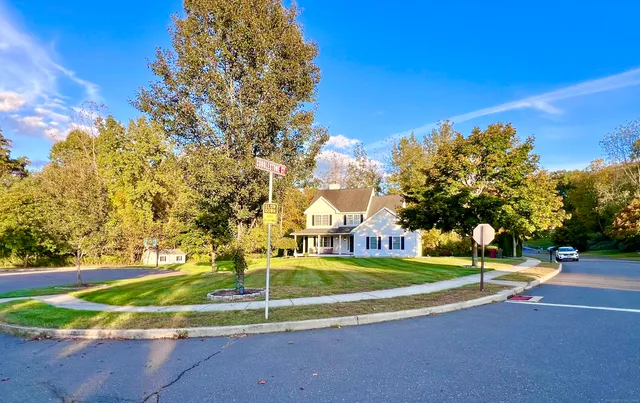 a view of a playground with basketball court