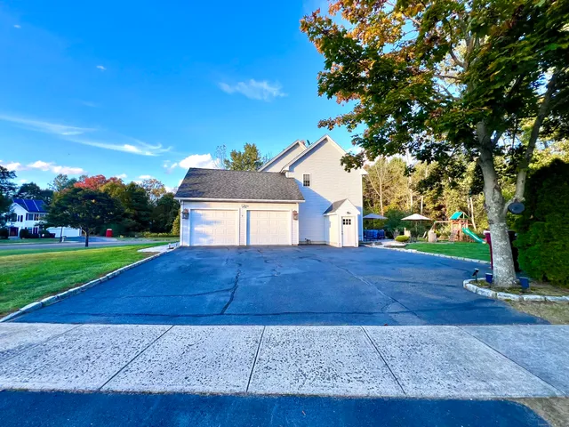 a house view with a garden space