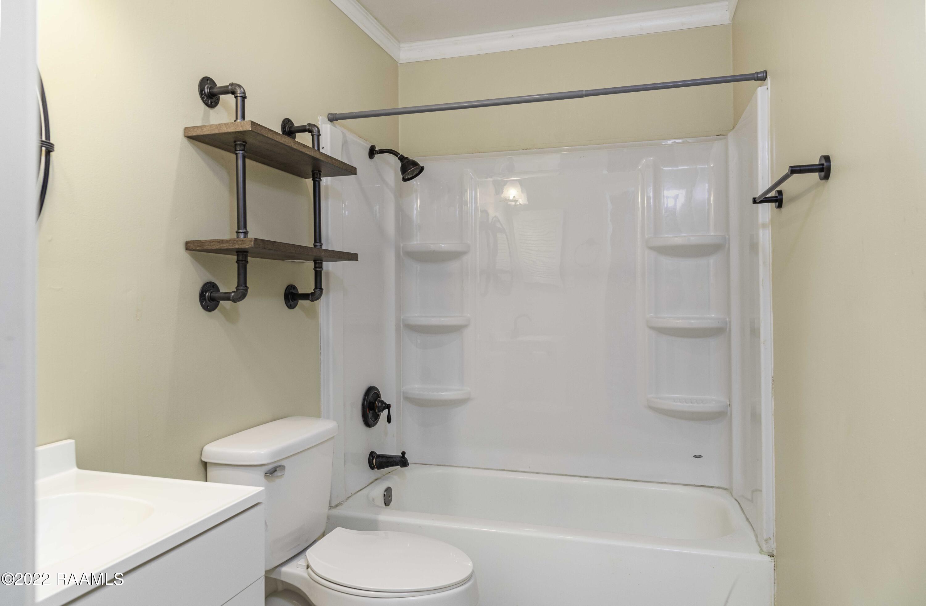701 South College Road, Unit 103 Lafayette, LA 70503 - Photo 12 of 15 1st Bedroom Bath 1