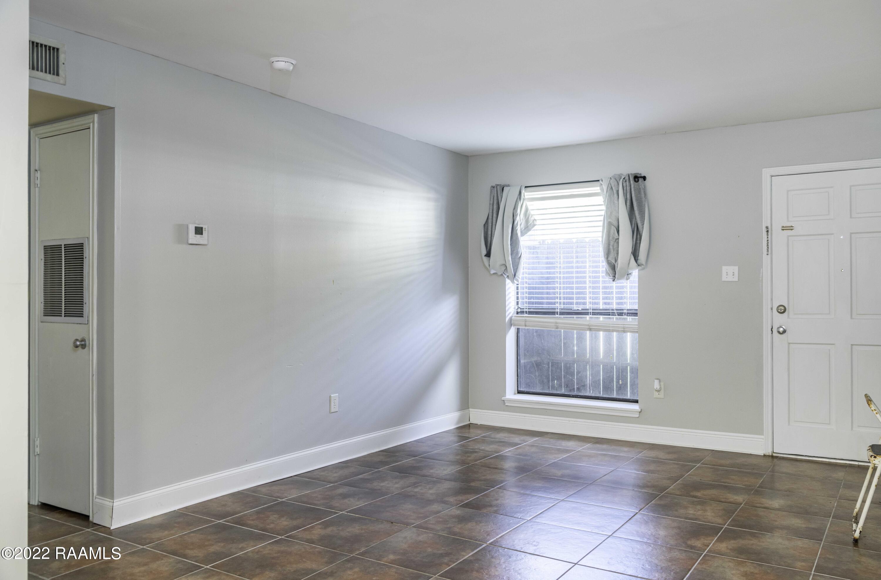 701 South College Road, Unit 103 Lafayette, LA 70503 - Photo 4 of 15 Living Room 1