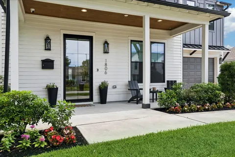 a view of a house with a garden
