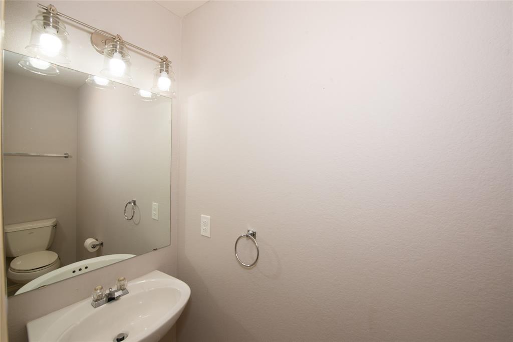 1157 Whistle Saginaw, TX 76131 - Photo 14 of 33 a bathroom with a shower and vanity