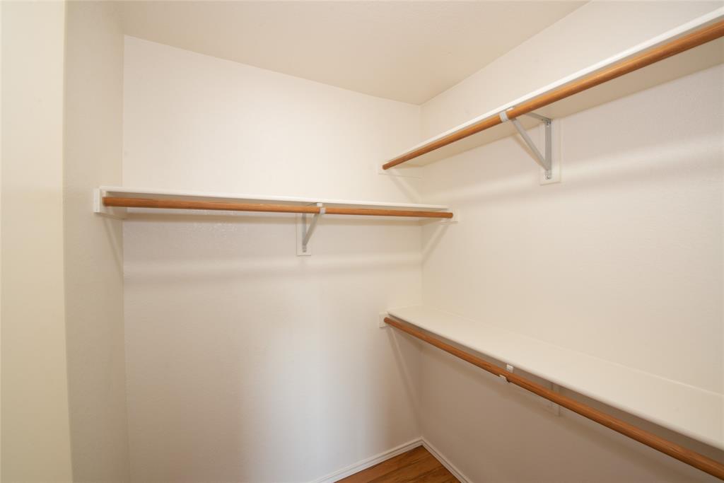 1157 Whistle Saginaw, TX 76131 - Photo 21 of 33 a view of a room with racks on the wall