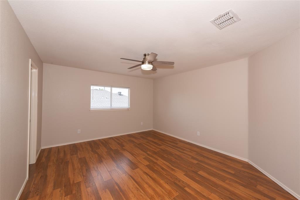 1157 Whistle Saginaw, TX 76131 - Photo 23 of 33 wooden floor in an empty room