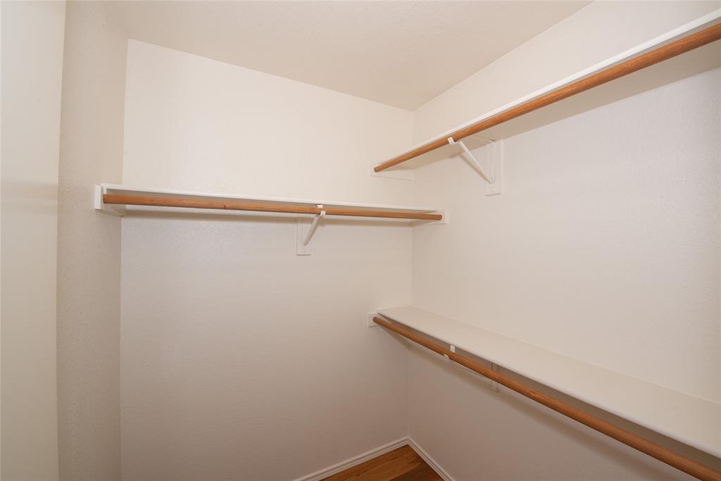 1157 Whistle Saginaw, TX 76131 - Photo 24 of 33 a view of a room with racks on the wall