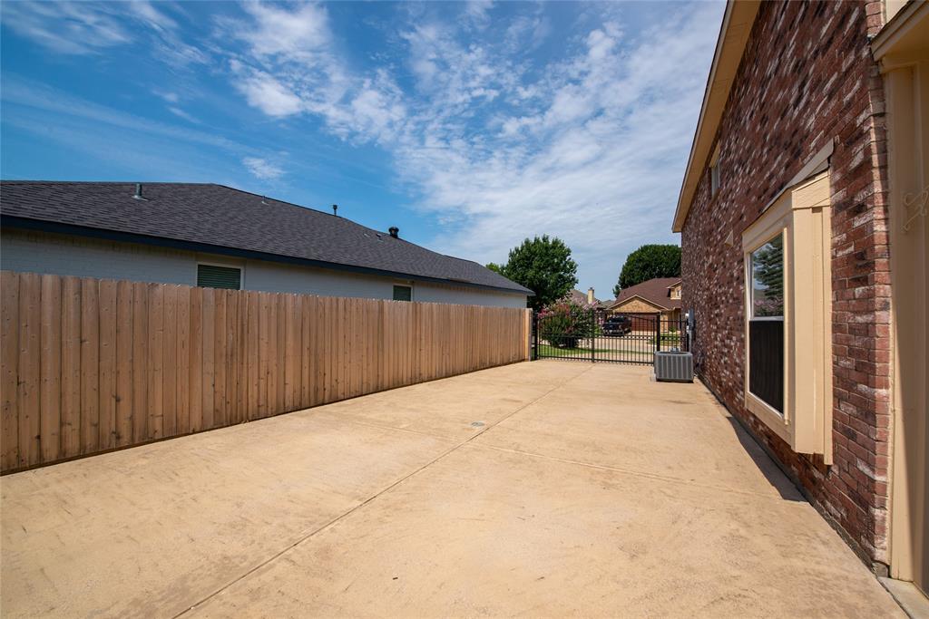 1157 Whistle Saginaw, TX 76131 - Photo 29 of 33 a view of a backyard with sitting area