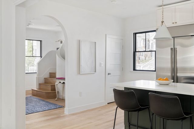 a living room with furniture and a table