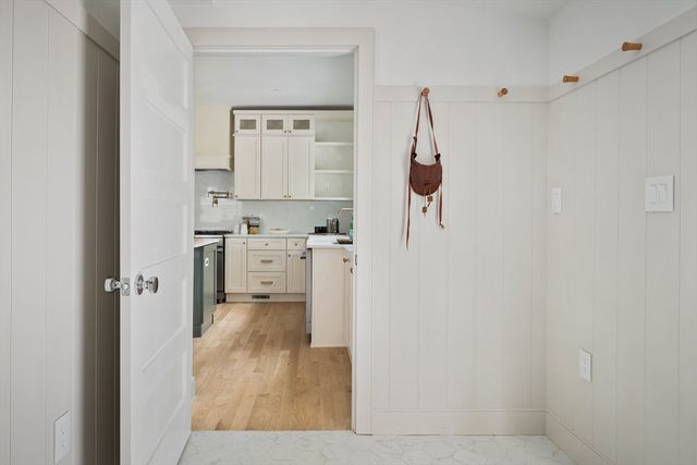a view of kitchen with wooden floor