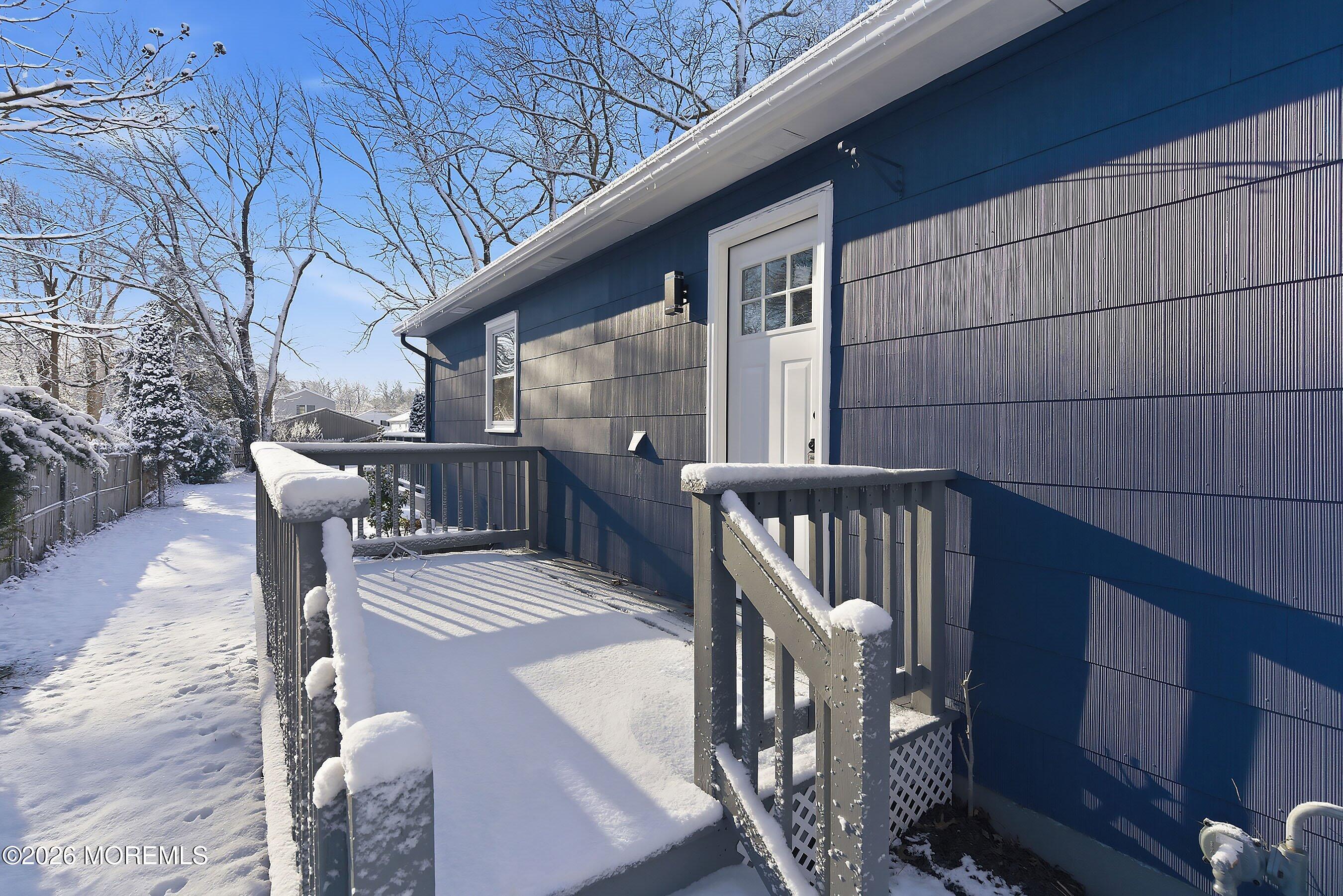 123 West 4th Street Howell, NJ 07731 - Photo 2 of 25 a view of balcony with wooden floor