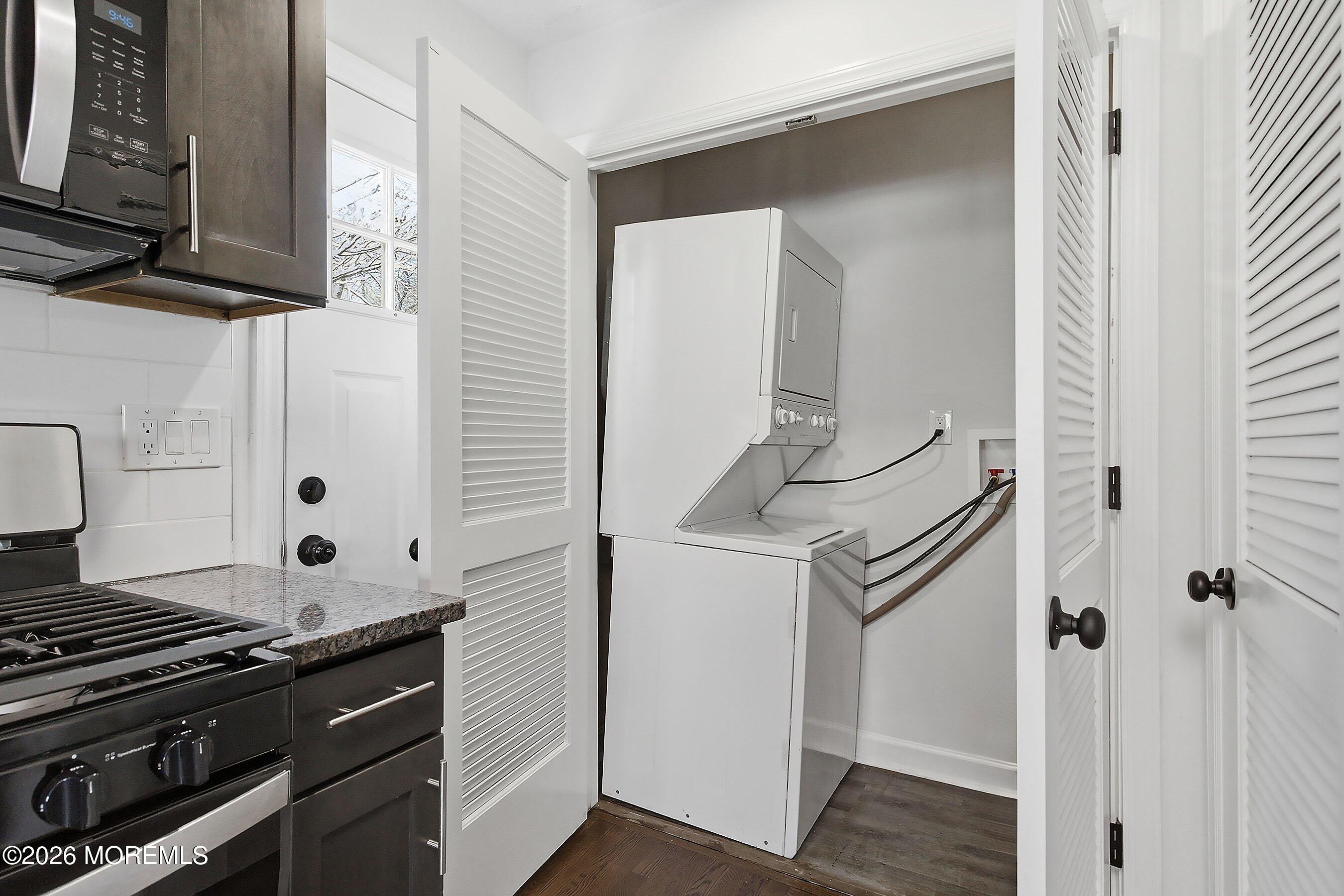 123 West 4th Street Howell, NJ 07731 - Photo 25 of 25 a kitchen with a refrigerator and a stove