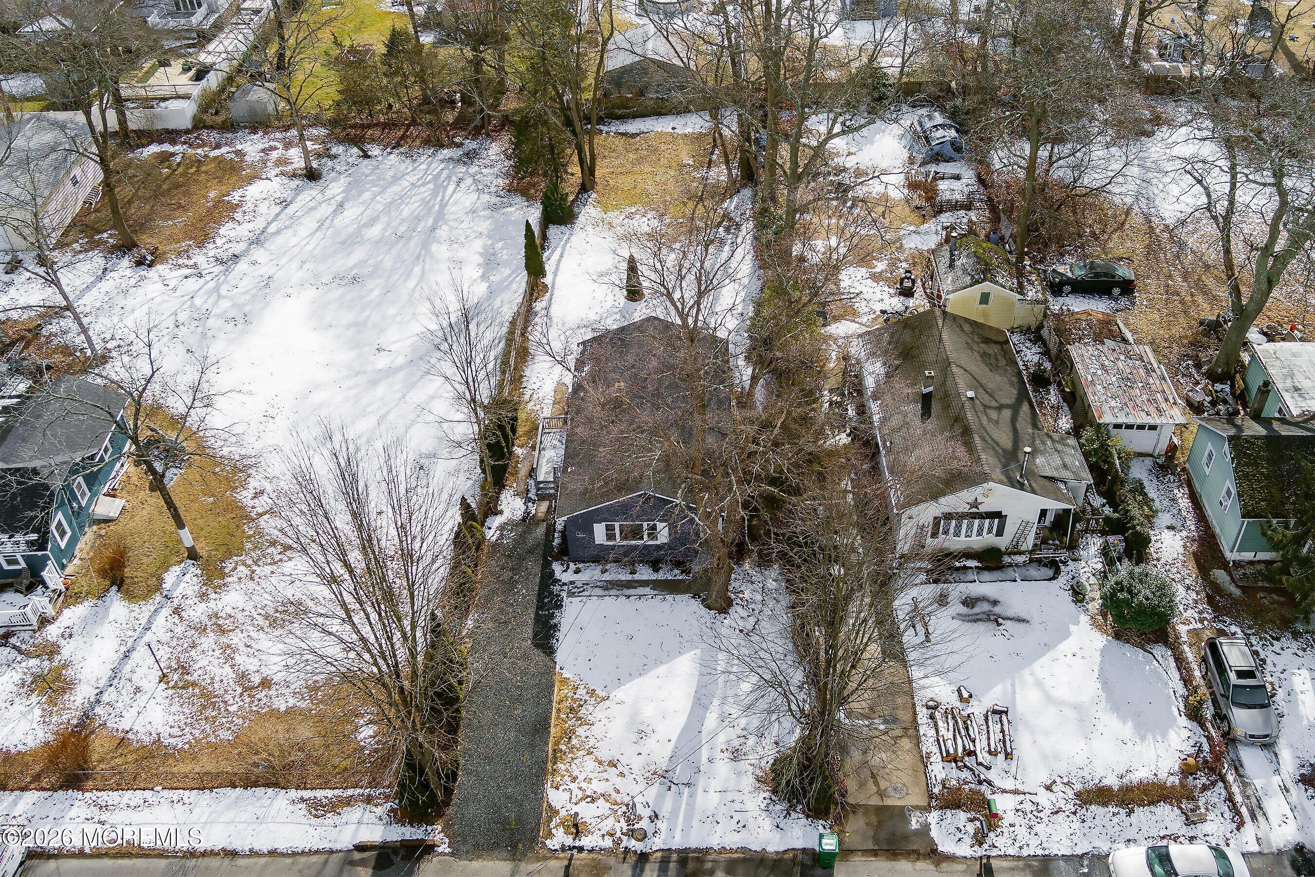 123 West 4th Street Howell, NJ 07731 - Photo 6 of 25 an aerial view of residential houses with outdoor space