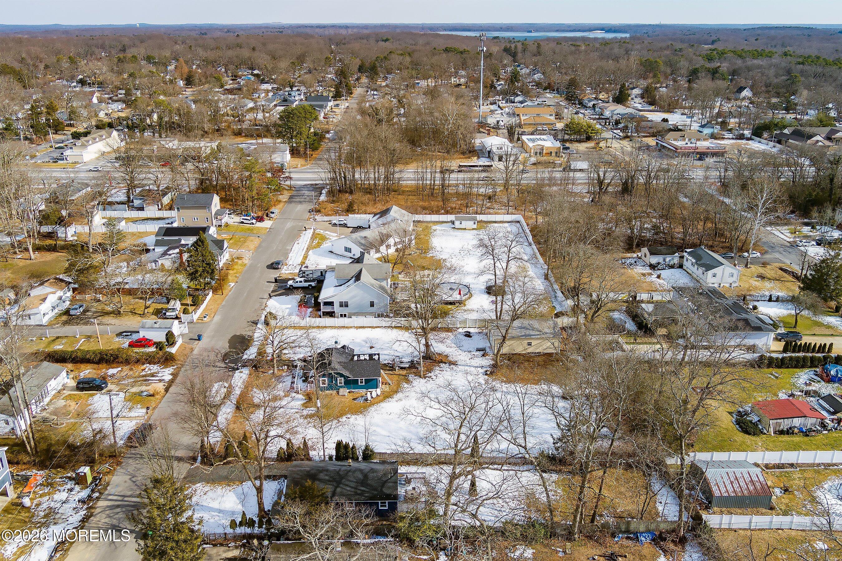 123 West 4th Street Howell, NJ 07731 - Photo 7 of 25 an aerial view of residential building and lake view
