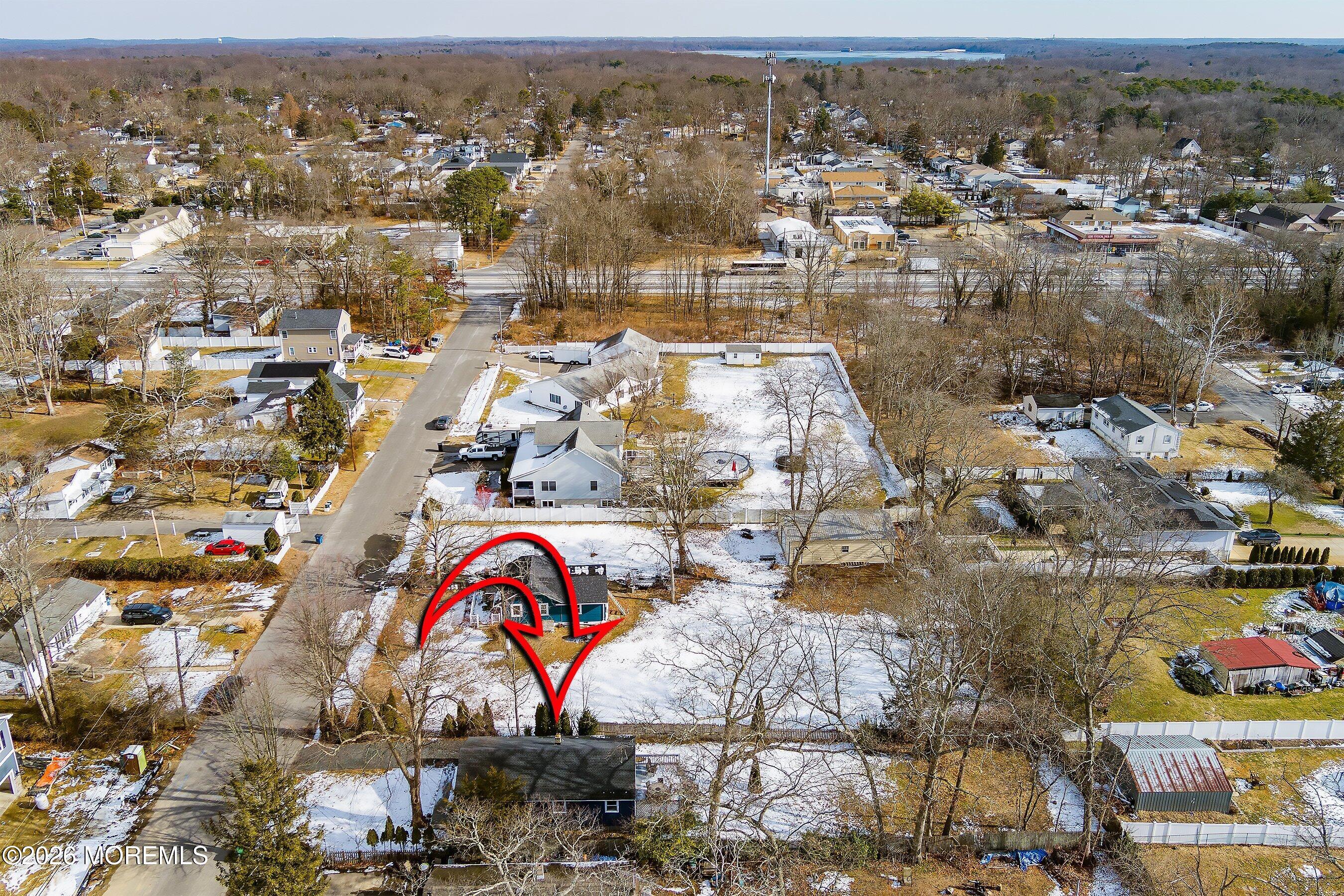123 West 4th Street Howell, NJ 07731 - Photo 8 of 25 an aerial view of residential building and lake