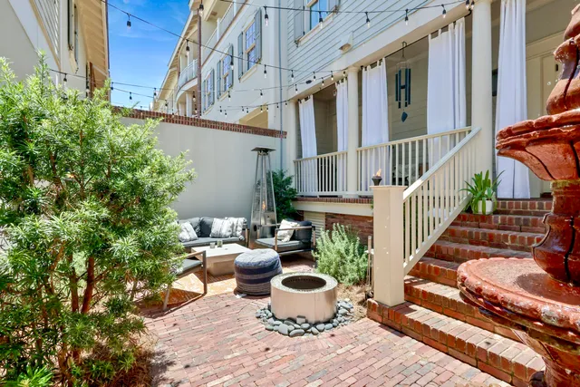 a spacious bathroom with a granite countertop sink and a mirror