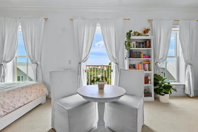 a kitchen with stainless steel appliances cabinets a stove and a window