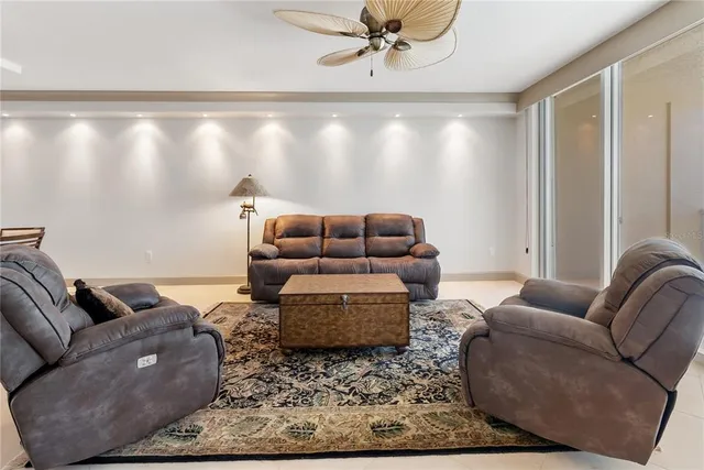 a large kitchen with granite countertop a sink and a stove
