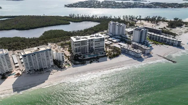 a kitchen with stainless steel appliances granite countertop a refrigerator sink and cabinets