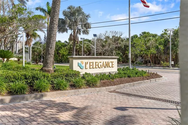 a kitchen with a sink window and cabinets