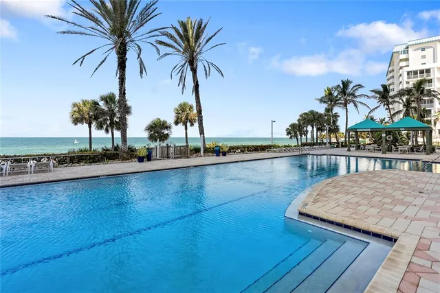 a bathroom with a sink double vanity and a mirror