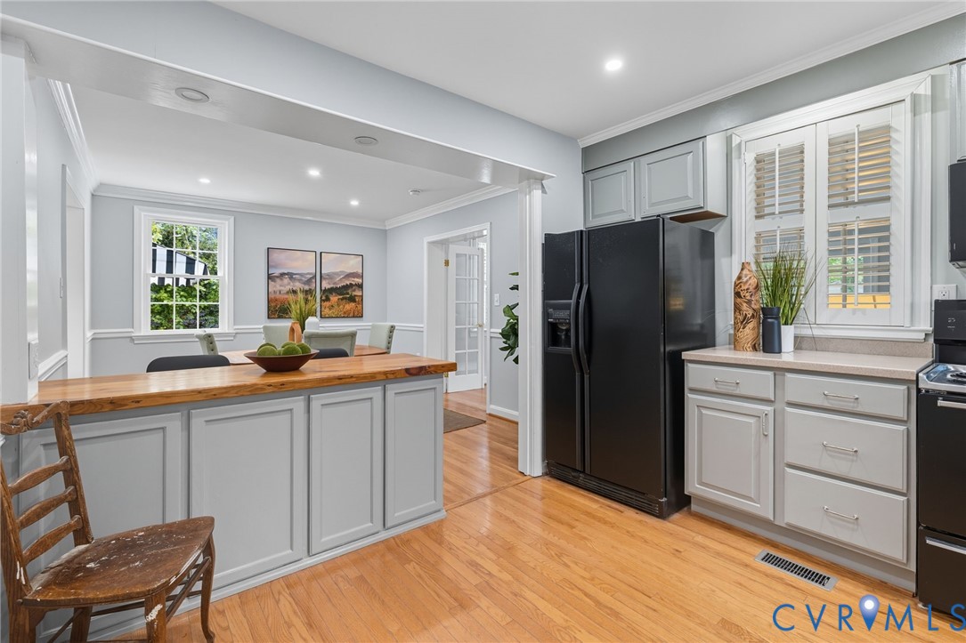 1008 Bevridge Road Richmond, VA 23226 - Photo 11 of 43 a kitchen with a refrigerator and a sink