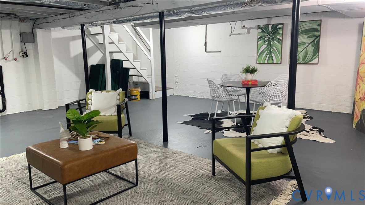 1008 Bevridge Road Richmond, VA 23226 - Photo 38 of 43 a living room with furniture and a potted plant