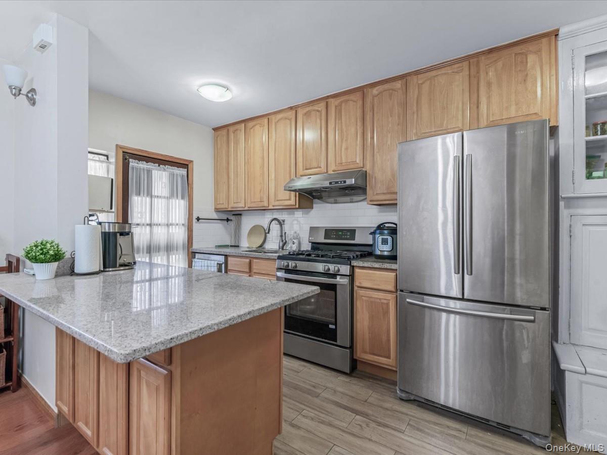 11109 75th Road Queens, NY 11375 - Photo 8 of 29 Open kitchen adjacent to dining room