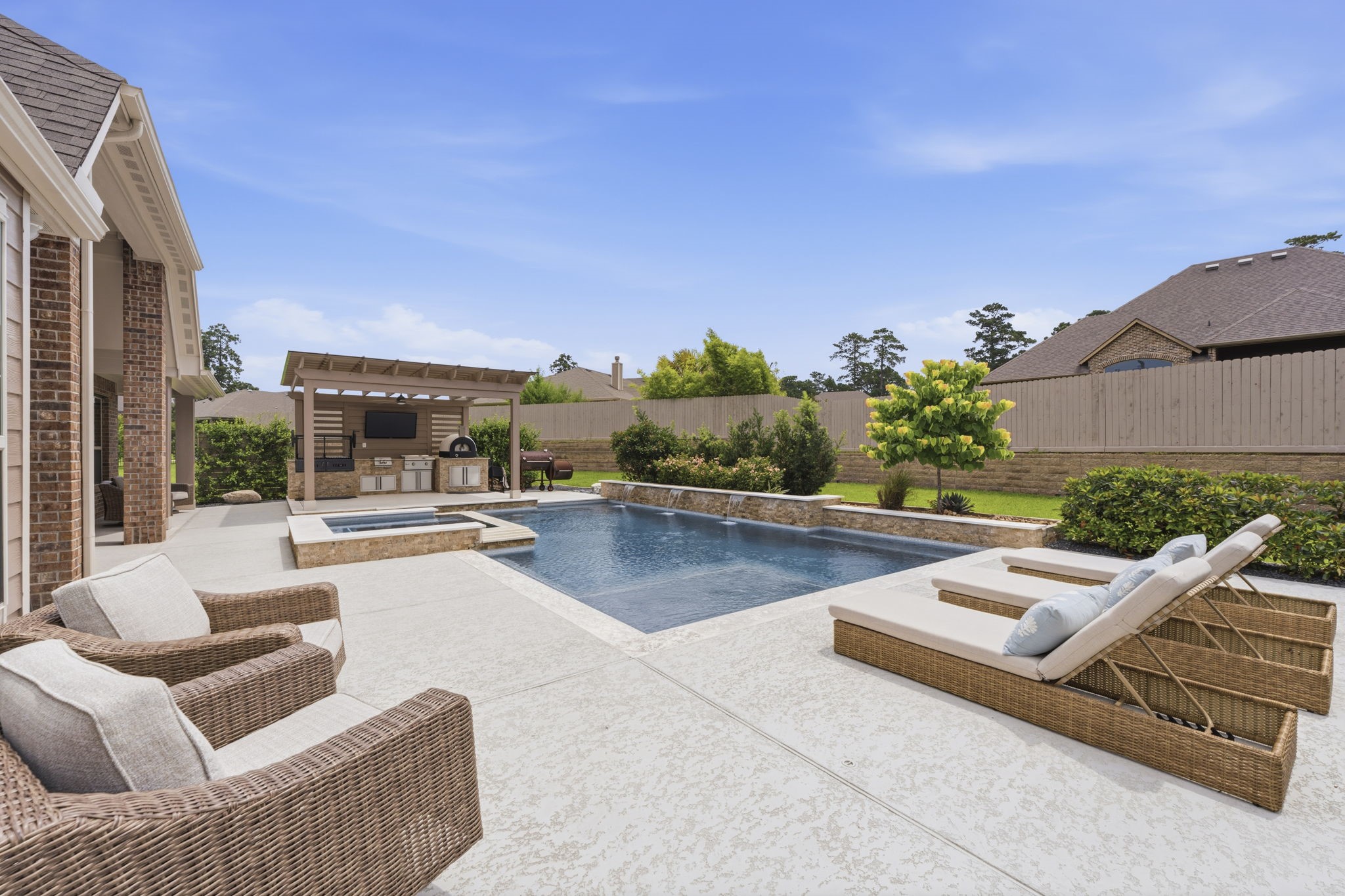 14012 Beartooth Bend Trail Conroe, TX 77384 - Photo 43 of 50 Plenty of pool decking for relaxing, entertaining, or parties!