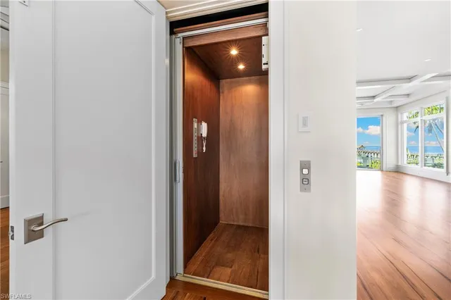 wooden floor in a hall with an entryway