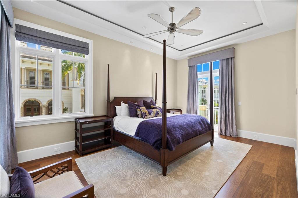 1270 Gulf Shore Boulevard South Naples, FL 34102 - Photo 8 of 24 a living room with a bed furniture and a window