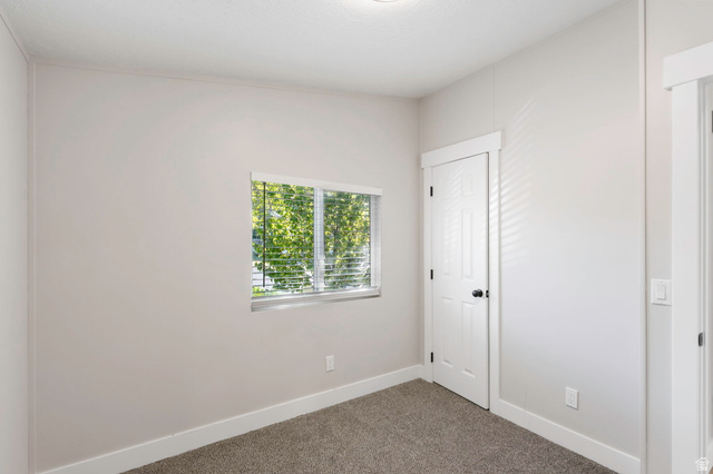 96 Barrington Way Layton, UT 84041 - Photo 11 of 28 Spare room with carpet floors and baseboards