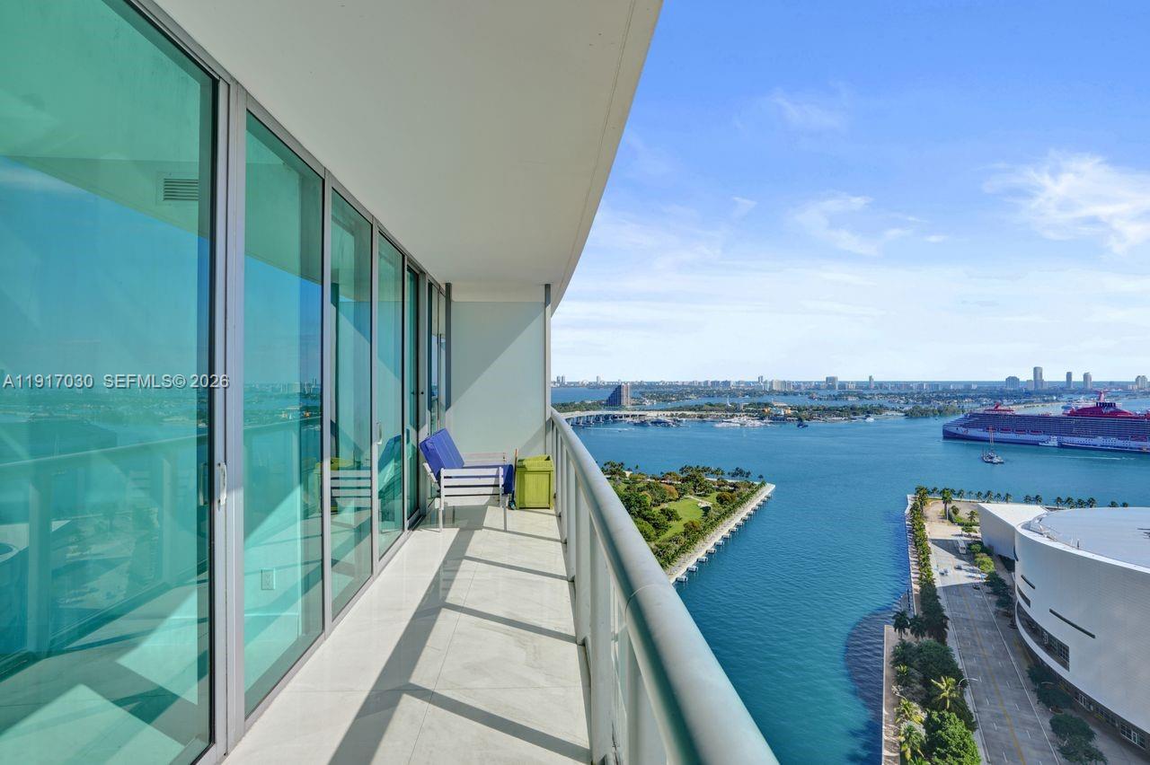 888 Biscayne Boulevard, Unit 2904 Miami, FL 33132 - Photo 12 of 27 a view of a balcony with chairs