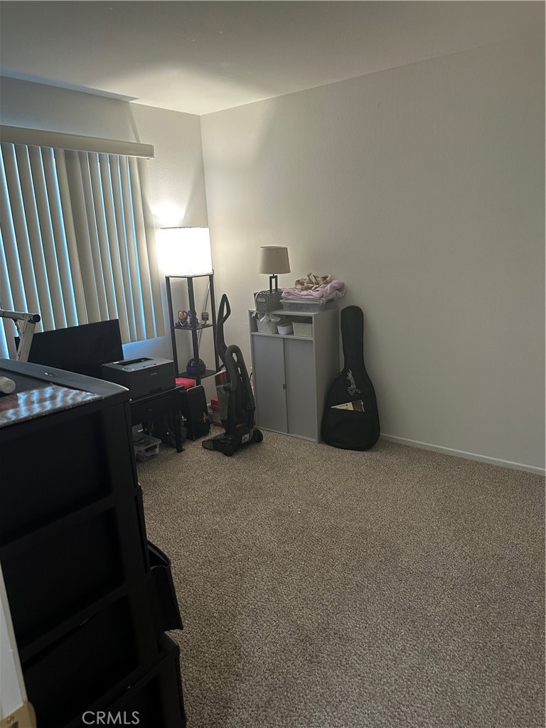 220 West Walnut Avenue, Unit B Rialto, CA 92376 - Photo 10 of 14 a room with storage and utility