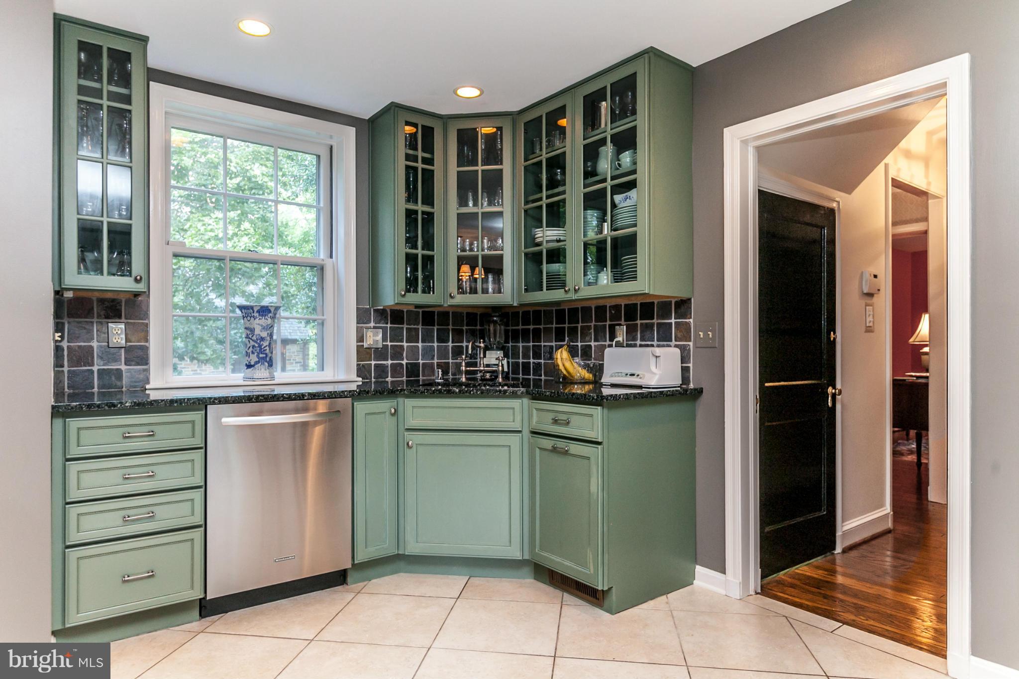 219 Paddington Road Baltimore, MD 21212 - Photo 8 of 30 a kitchen with a sink and cabinets