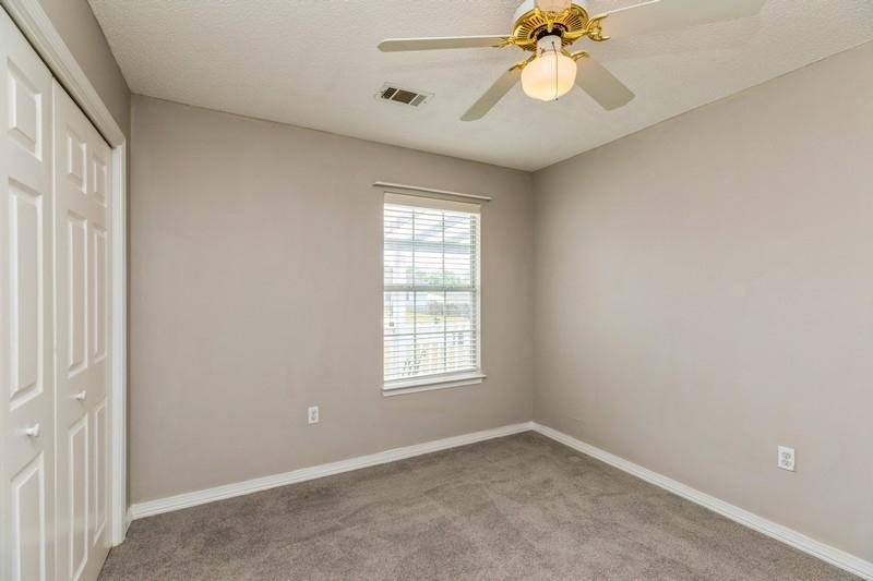 439 Northview Lane Crestview, FL 32536 - Photo 14 of 26 an empty room with a window and a fan