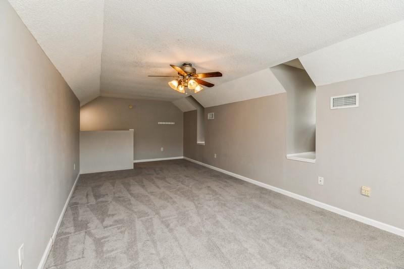 439 Northview Lane Crestview, FL 32536 - Photo 21 of 26 a view of a livingroom with a ceiling fan and chandelier fan