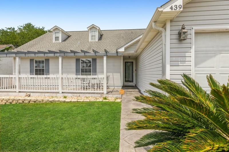 439 Northview Lane Crestview, FL 32536 - Photo 3 of 26 a front view of a house with a garden