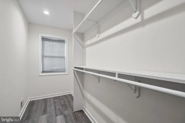 a view of walk in closet with window