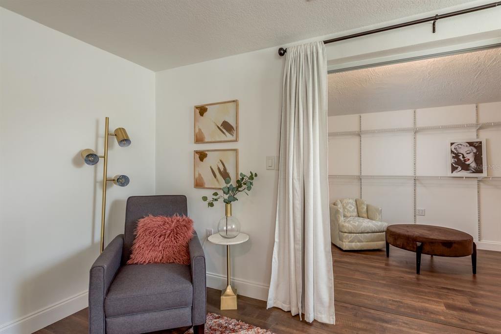 9110 Rainbow Lane Port Richey, FL 34668 - Photo 17 of 29 a living room with furniture and a window