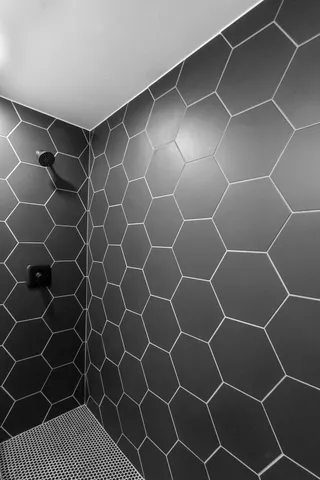 a bathroom with a sink and a shower