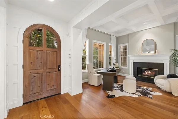 a bedroom with furniture and a fireplace