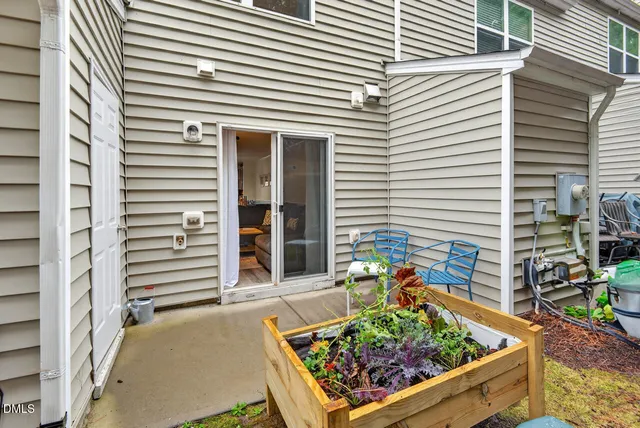 a view of a chairs and tables in the balcony