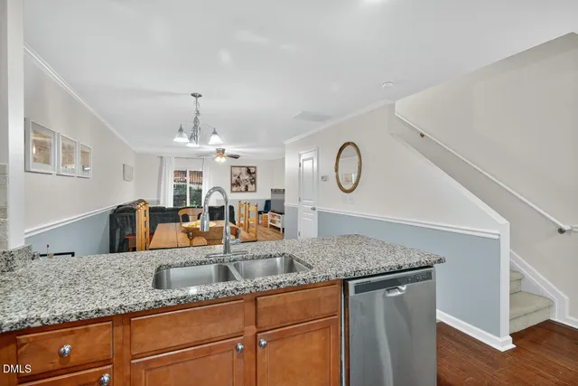 a view of living room with granite countertop furniture and fireplace