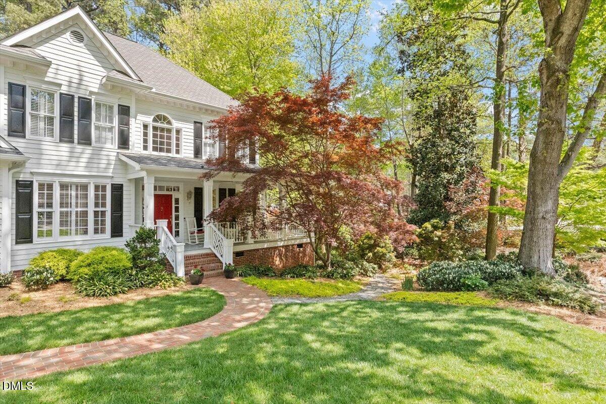 9108 Hometown Drive Raleigh, NC 27615 - Photo 3 of 41 front view of a house with a yard