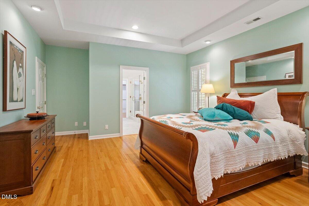 9108 Hometown Drive Raleigh, NC 27615 - Photo 34 of 41 a bedroom with bed and window