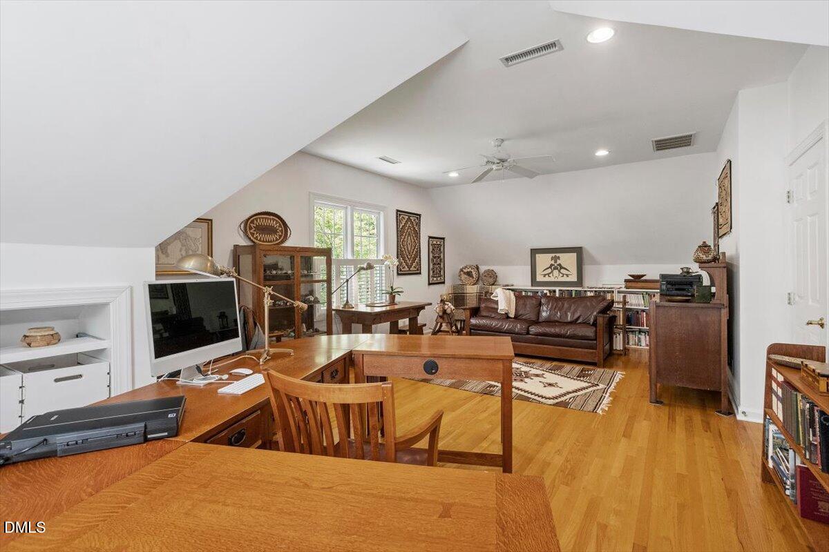 9108 Hometown Drive Raleigh, NC 27615 - Photo 40 of 41 a living room with furniture and a flat screen tv