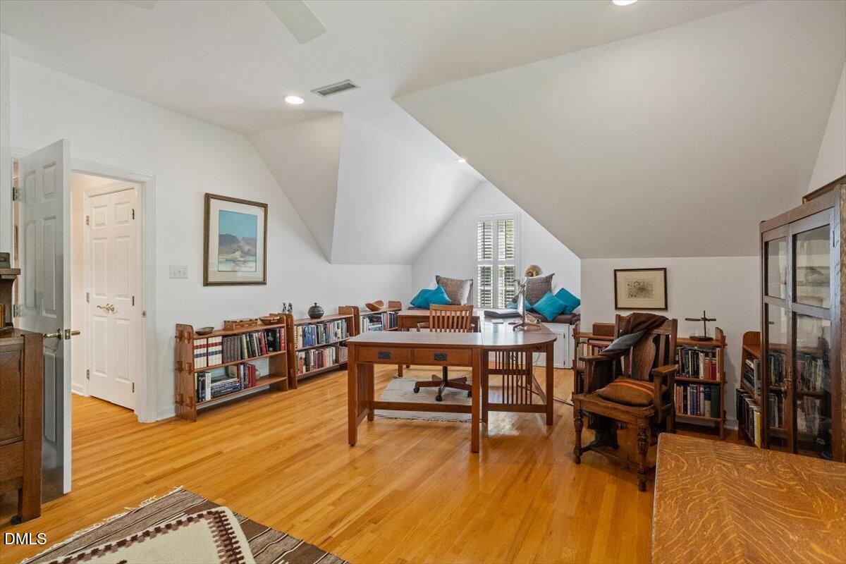 9108 Hometown Drive Raleigh, NC 27615 - Photo 41 of 41 a living room with furniture and a wooden floor