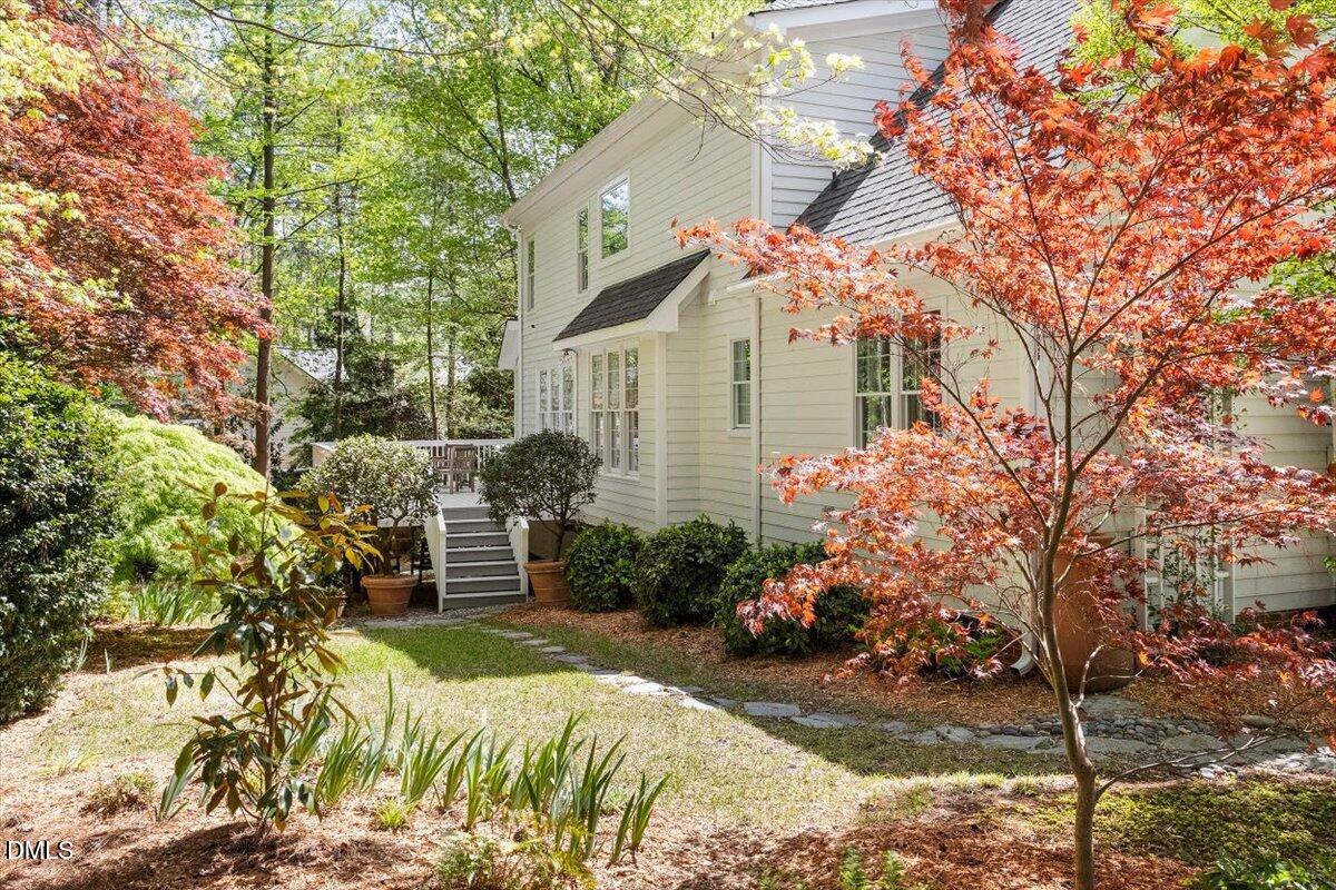 9108 Hometown Drive Raleigh, NC 27615 - Photo 7 of 41 a front view of a house with a yard