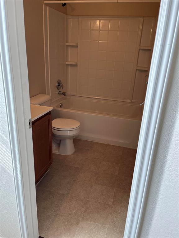 10548 Flagstaff Run Fort Worth, TX 76140 - Photo 9 of 20 a bathroom with a sink a toilet and shower