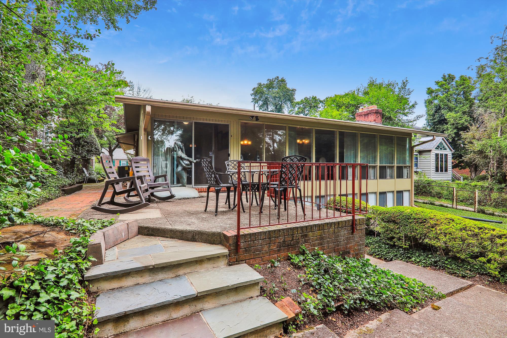 122 St Lawrence Drive Silver Spring, MD 20901 - Photo 4 of 9 a view of a porch with furniture and garden